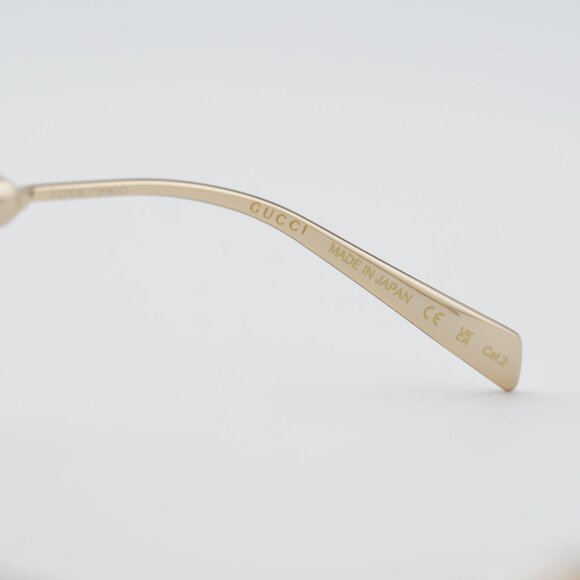 Gucci GG1920S 003 Sunglasses Shiny Endura Gold with Pearl Cat Eye Frame main image 10